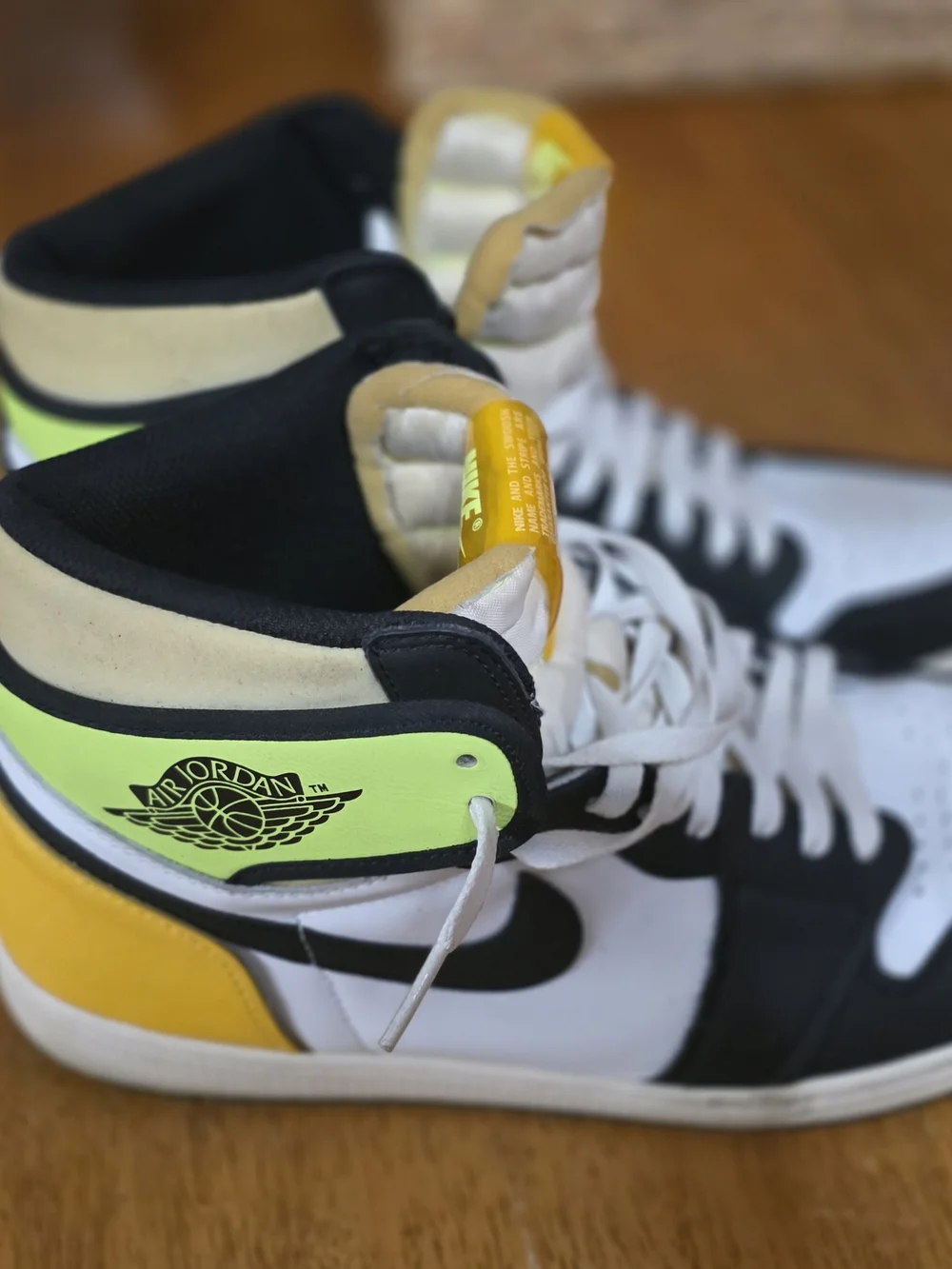 Jordan Men’s High-Top Sneakers in Black, White & Yellow Tongue